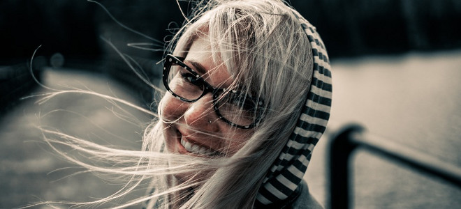 Smiling Young Woman in Trendy Eyewear